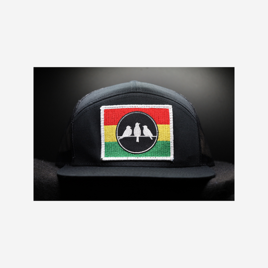 3 Bird Lifestyle Seven-Panel Trucker •Black & Black • 3 Bird Rasta Flag Patch