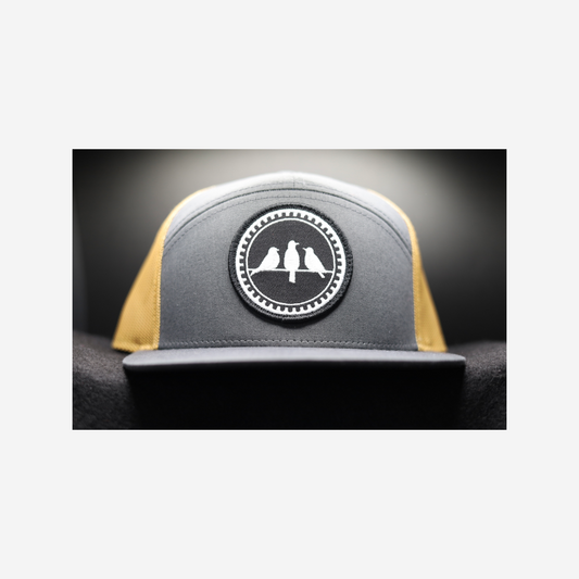 3 Bird Lifestyle Seven-Panel Trucker • Charcoal & Old Gold •3 Birds Only Patch