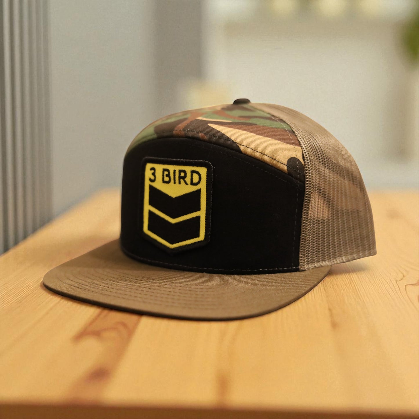3 Bird Lifestyle Seven-Panel Trucker
•Black & Camo & Loden • 3 Bird Patch