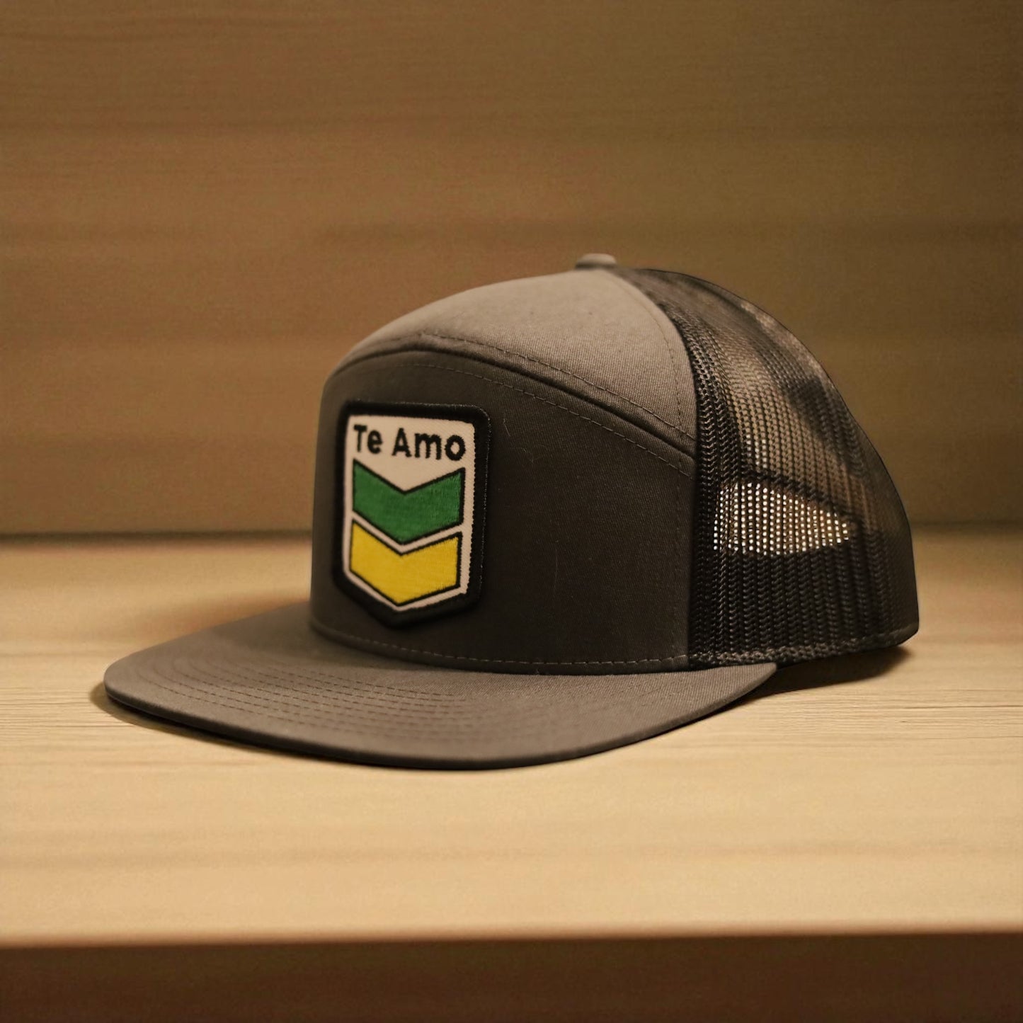 3 Bird Lifestyle Seven-Panel Trucker • Charcoal & Black • Te Amo (Jamaica) Patch