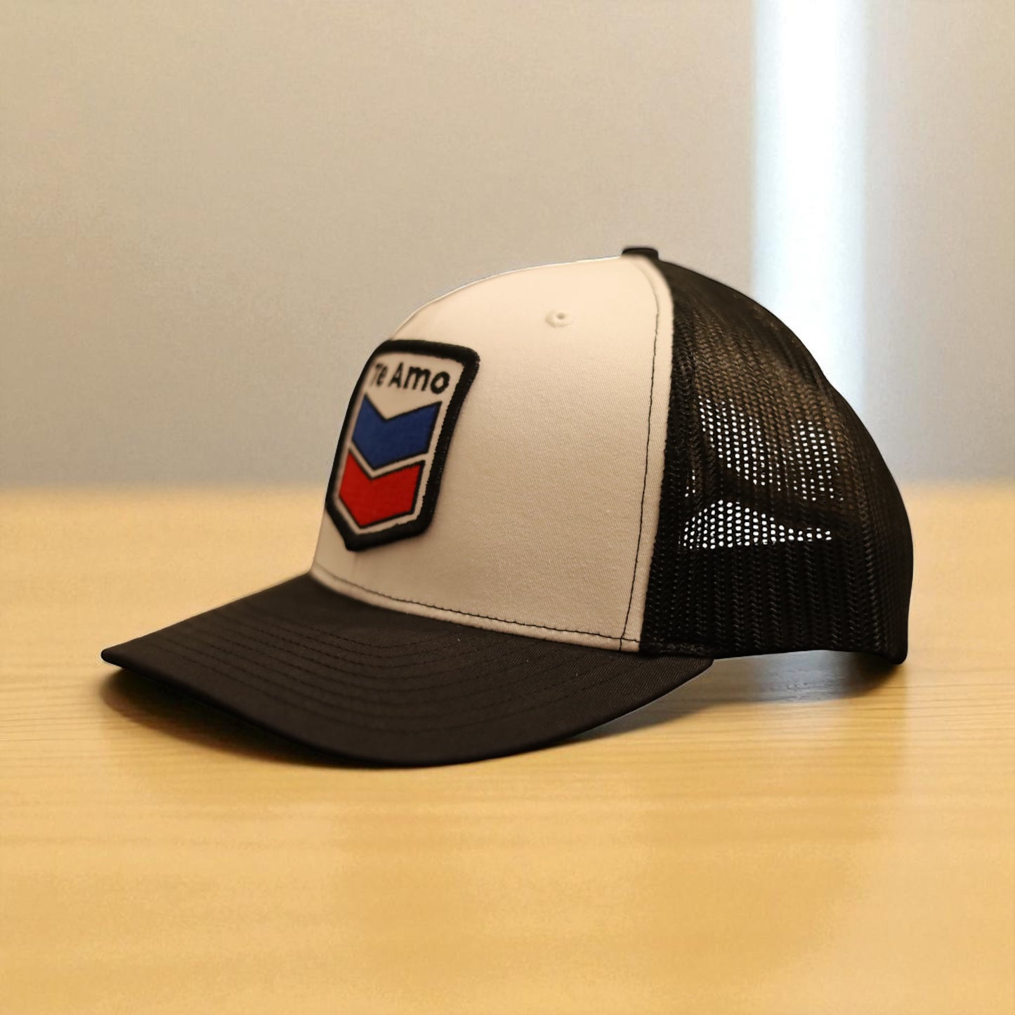 3 Bird Lifestyle Trucker Hat • White / Black • Te Amo (Blue & Red) Patch