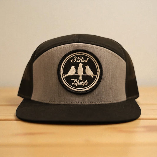 3 Bird Lifestyle Seven-Panel Trucker 
 • Heather Grey & Black• 3 Bird Lifestyle Patch
