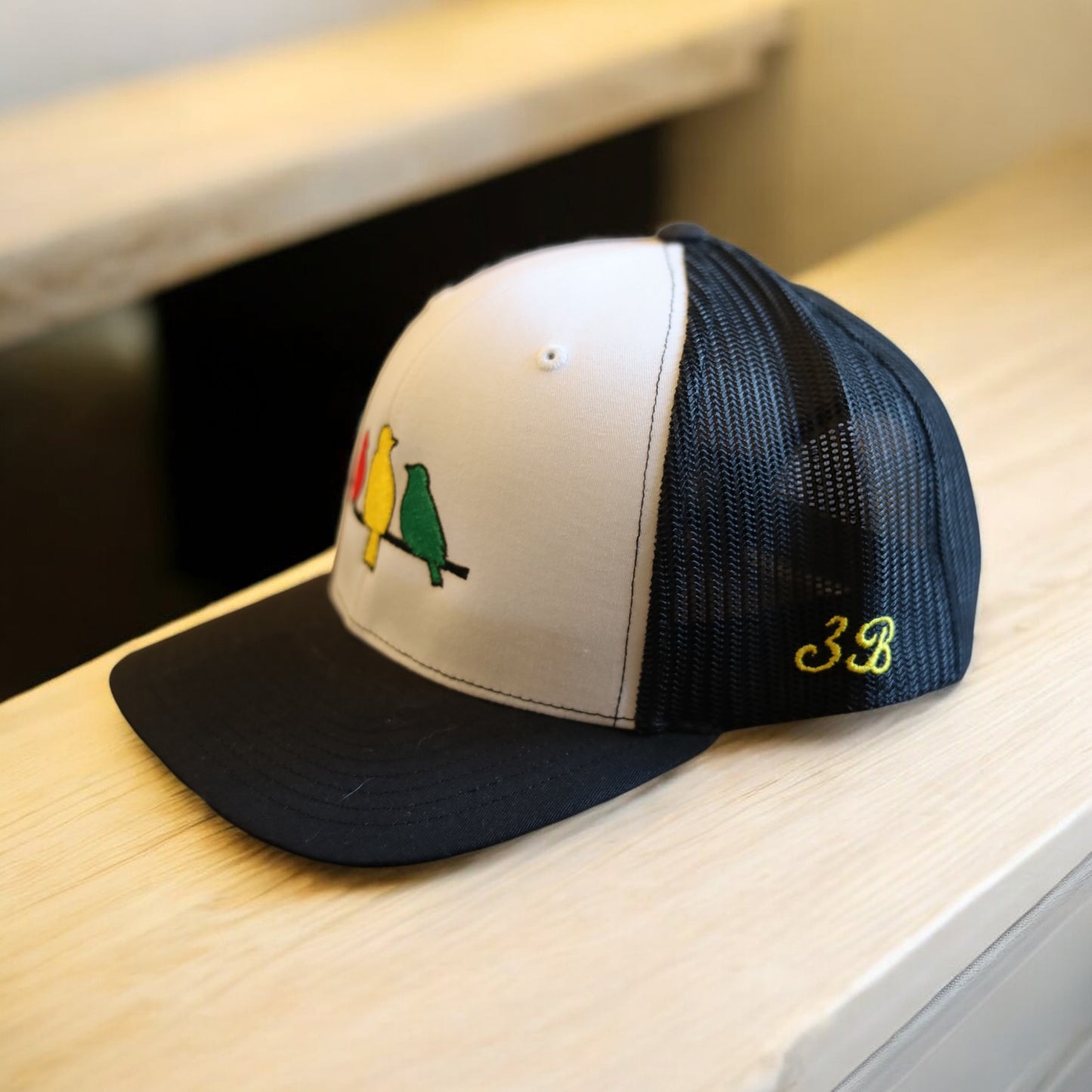3 Bird Lifestyle Trucker Hat • Embroidered Rasta Birds
