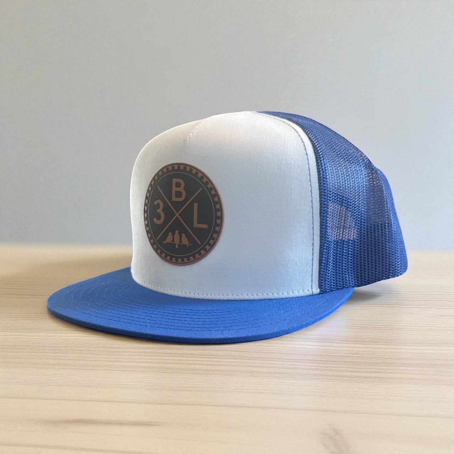 3 Bird Lifestyle Flat Bill Trucker • Royal Blue & White • 3BLX Leather Patch