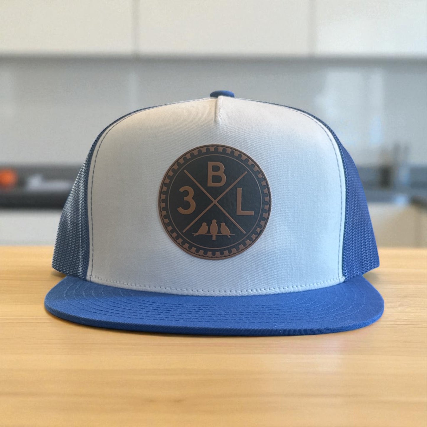 3 Bird Lifestyle Flat Bill Trucker • Royal Blue & White • 3BLX Leather Patch