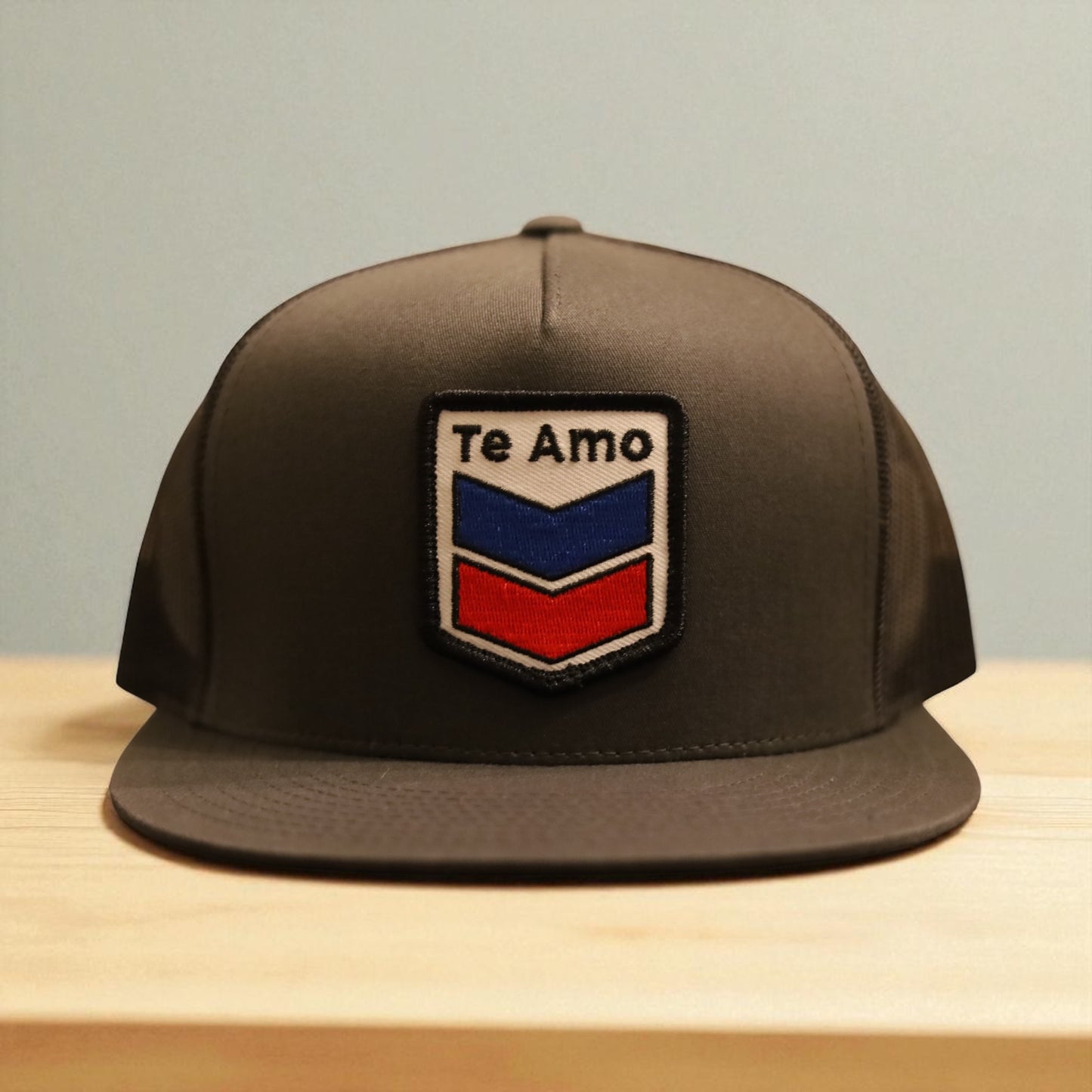 3 Bird Lifestyle Flat Bill Trucker • Charcoal • Te Amo (Blue & Red) Patch