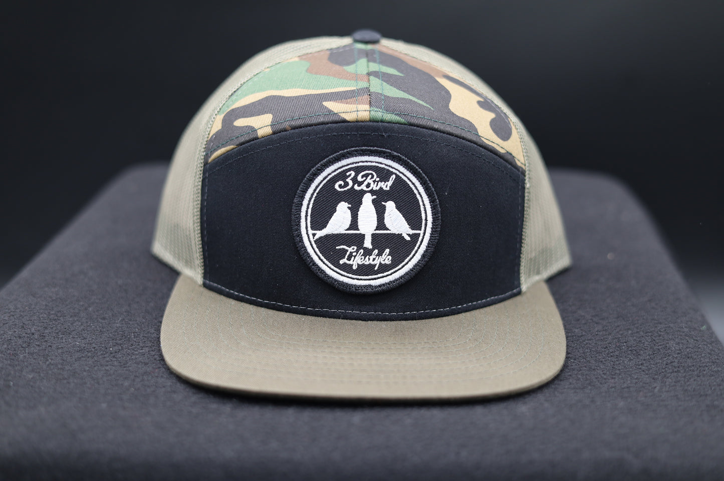 3 Bird Lifestyle Seven-Panel Trucker 
 •Black & Camo & Loden • 3 Bird Lifestyle Patch