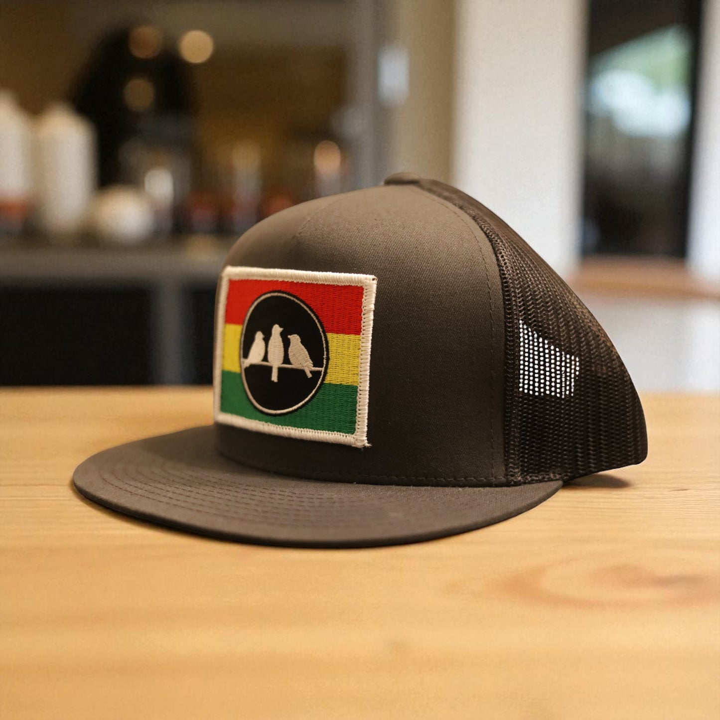 3 Bird Lifestyle Flat Bill Trucker • Charcoal Grey and Grey• 3 Bird Rasta Flag Patch