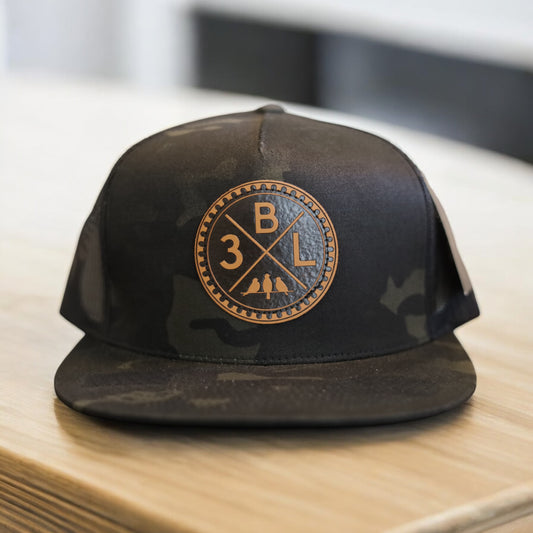 3 Bird Lifestyle Flat Bill Trucker •Multicam Black & Black • 3BLX Leather Patch