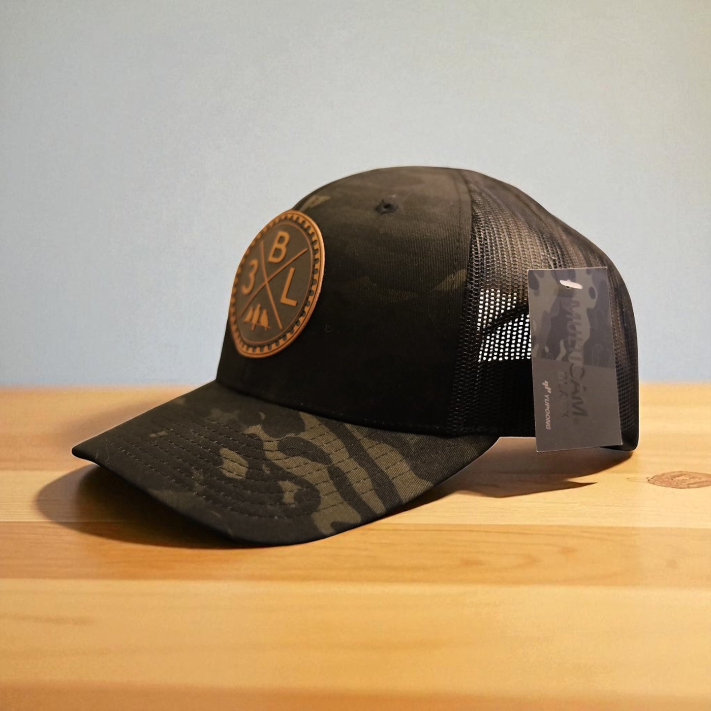 3 Bird Lifestyle Trucker Hat •Multicam Black & Black • Leather Patch 3BLX