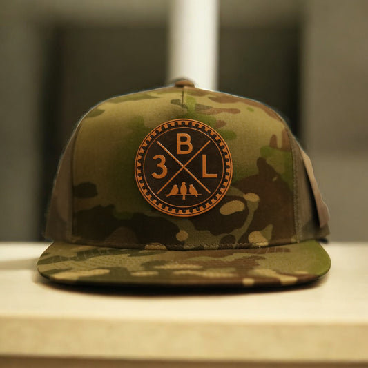 3 Bird Lifestyle Flat Bill Trucker • Multicam Tropic & Green • 3BLX Leather Patch