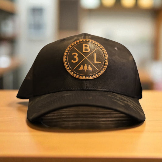 3 Bird Lifestyle Trucker Hat •Multicam Black & Black • Leather Patch 3BLX