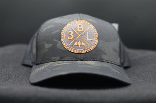 3 Bird Lifestyle Trucker Hat •Multicam Black & Black • Leather Patch 3BLX