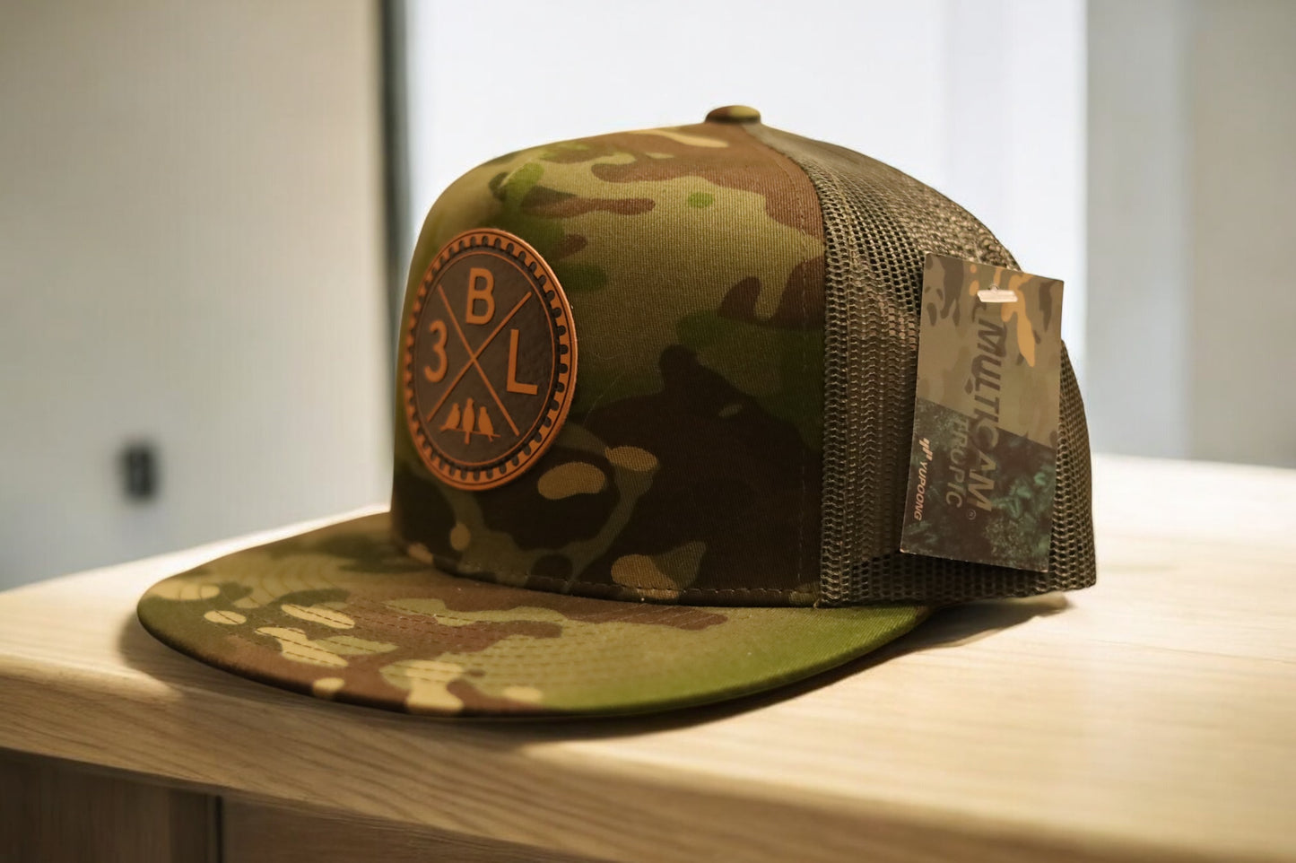 3 Bird Lifestyle Flat Bill Trucker • Multicam Tropic & Green • 3BLX Leather Patch