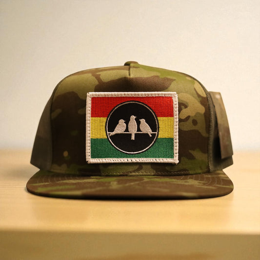 3 Bird Lifestyle Flat Bill Trucker • Multicam Tropic & Green • 3 Bird Rasta Flag Patch