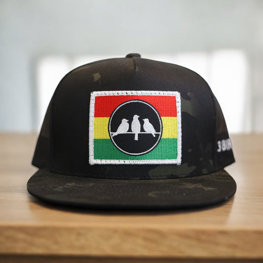 3 Bird Lifestyle Flat Bill Trucker
 •Multicam Black & Black • 3 Bird Rasta Flag Patch