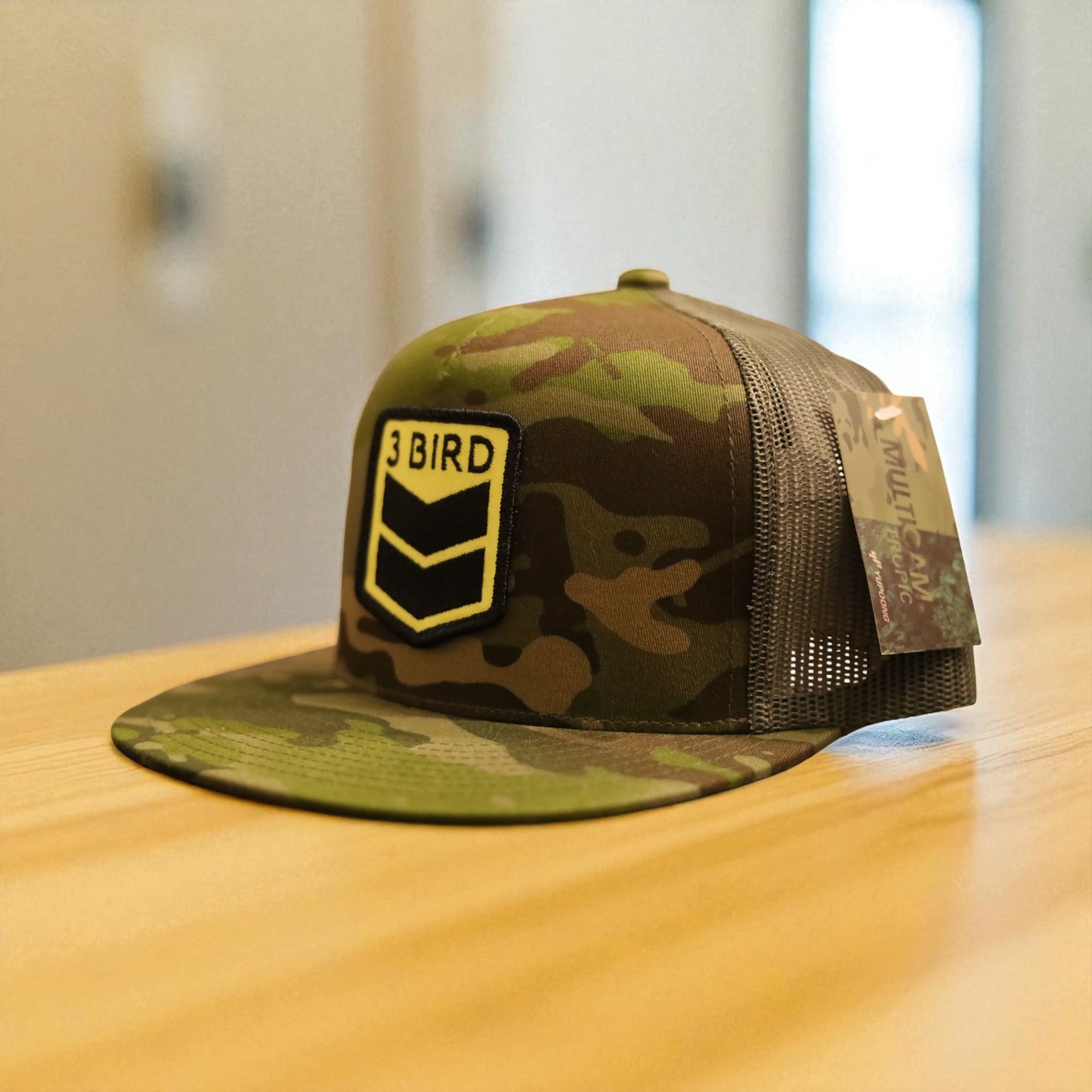3 Bird Lifestyle Flat Bill Trucker • Multicam Tropic & Green • 3 Bird Patch