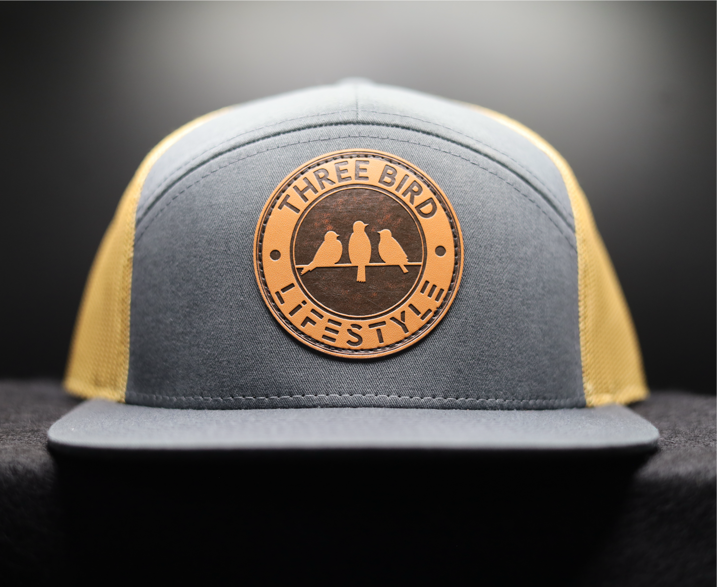 3 Bird Lifestyle Seven-Panel Trucker •Charcoal & Old Gold• 3 Bird Lifestyle Leather Patch