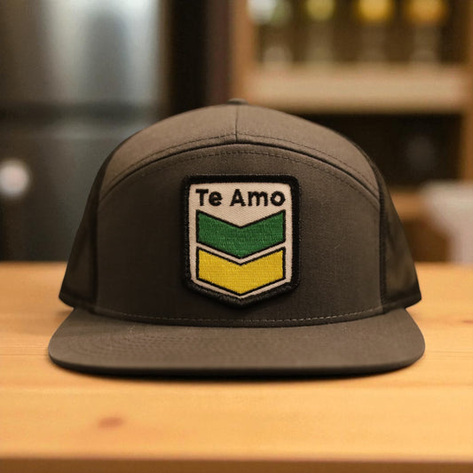 3 Bird Lifestyle Seven-Panel Trucker • Charcoal & Black • Te Amo (Jamaica) Patch