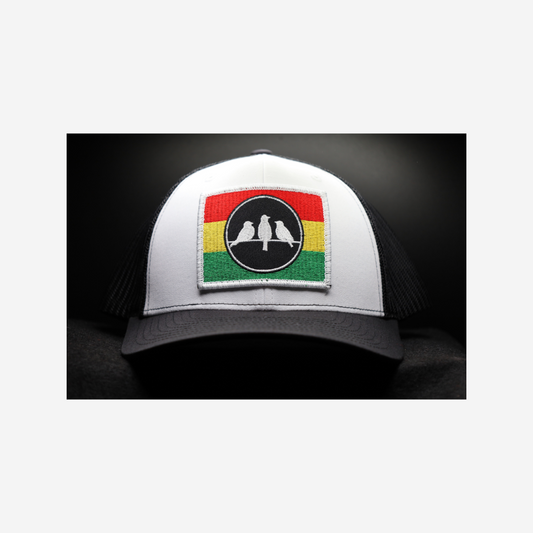 3 Bird Lifestyle Trucker Hat • White & Black • 3 Bird Rasta Flag Patch