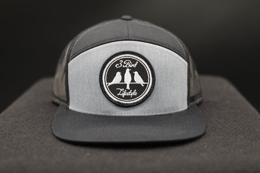 Seven-Panel Trucker • Heather Grey & Black• 3 Bird Lifestyle Patch