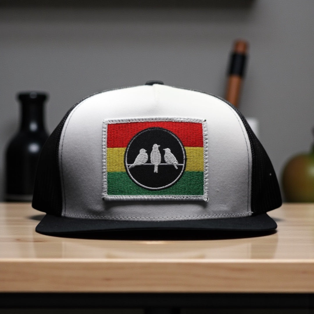 3 Bird Lifestyle Flat Bill Trucker
•Black and White • 3 Bird Rasta Flag Patch