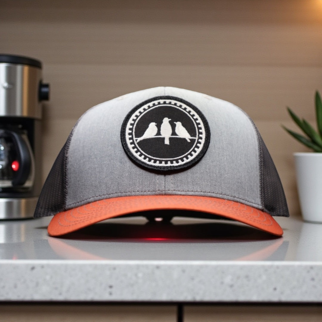 3 Bird Lifestyle Trucker Hat •Heather Grey & Charcoal & Dark Orange • 3 Birds Only Patch