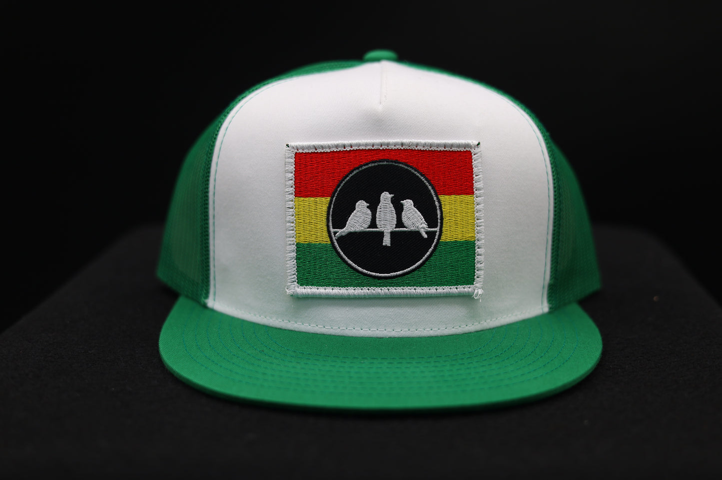 3 Bird Lifestyle Flat Bill Trucker
 •Green and White • 3 Bird Rasta Flag Patch