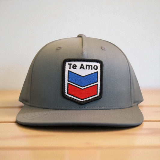 3 Bird Lifestyle Pinch Front Structured Trucker • Heather Grey • Te Amo (Blue & Red) Patch